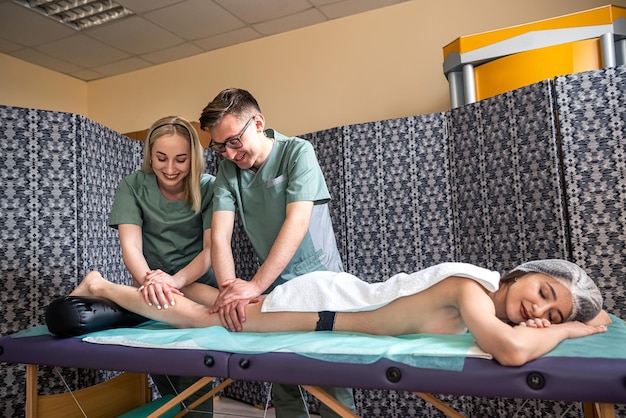 puerto pollensa gym -  - female client enjoys relaxing foot massage spa salon 359031 33228